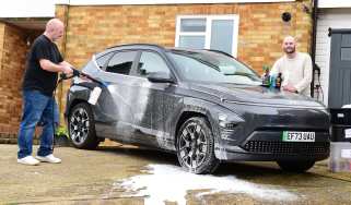 Auto Express creative director Darren Wilson washing the Hyundai Kona Electric